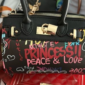 affirmations purse . brand new never worn still has paper inside